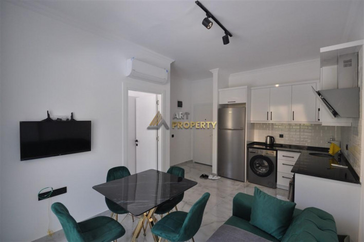 Новая меблированная квартира планировки 1+1, 46м2 в районе Авсаллар - Ракурс 10