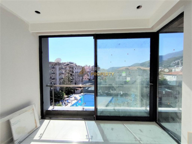 Апартаменты 1+1, 65м2 с видом на горы в шаговой доступности от пляжа Клеопатры - Ракурс 5