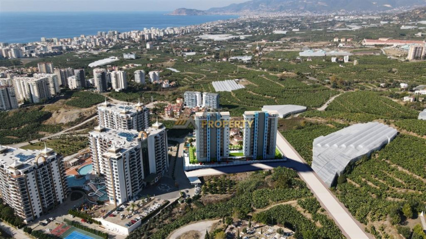 Апартаменты планировки 1+1, 51м2 в ЖК на стадии строительства, район Махмутлар - Ракурс 17