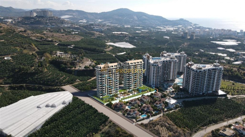 Апартаменты планировки 1+1, 51м2 в ЖК на стадии строительства, район Махмутлар - Ракурс 24