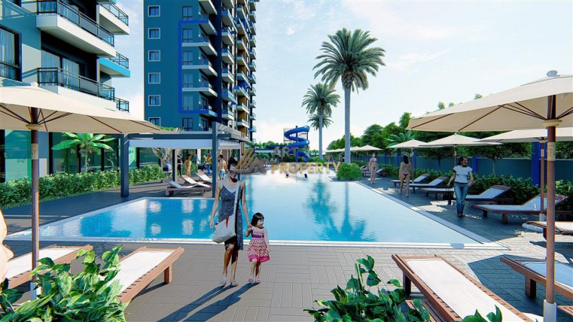 Апартаменты планировки 1+1, 51м2 в ЖК на стадии строительства, район Махмутлар - Ракурс 37