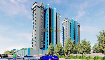 Апартаменты планировки 1+1, 51м2 в ЖК на стадии строительства, район Махмутлар - Ракурс 44