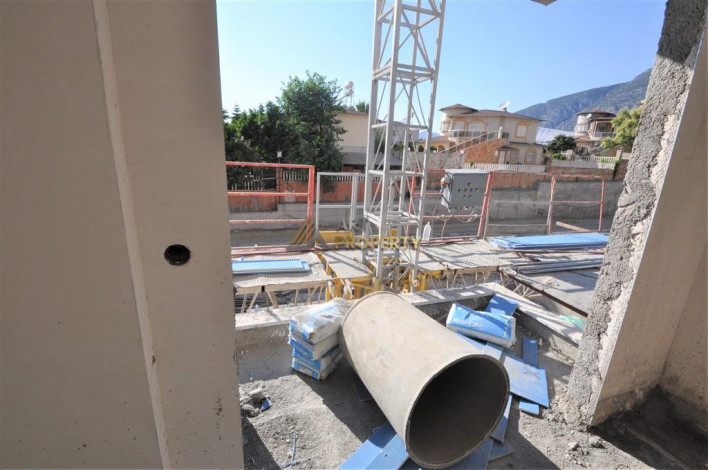 Апартаменты планировки 1+1, 51м2 в ЖК на стадии строительства, район Махмутлар - Ракурс 47