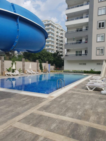 Двухкомнатная меблированная квартира в начале района Махмутлар, 60 м2 - Ракурс 10