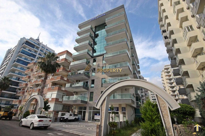 Меблированная двухкомнатная квартира в центре Махмутлара  Алания, 60 м2 - Ракурс 3