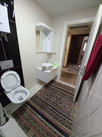 Меблированная двухкомнатная квартира в центре Махмутлара  Алания, 60 м2 - Ракурс 4