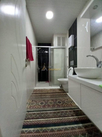 Меблированная двухкомнатная квартира в центре Махмутлара  Алания, 60 м2 - Ракурс 8