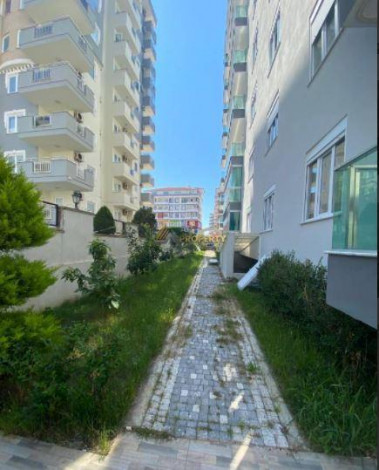 Меблированная двухкомнатная квартира в центре Махмутлара  Алания, 60 м2 - Ракурс 17