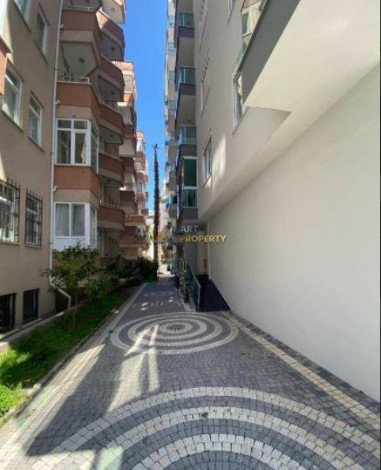 Меблированная двухкомнатная квартира в центре Махмутлара  Алания, 60 м2 - Ракурс 18