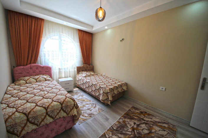 Трехкомнатная квартира с мебелью и техникой в Махмутларе в 550 метрах от моря, 115 м2 - Ракурс 6