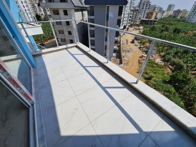 Двухкомнатная квартира в новом доме в районе Махмутлар, Алания, 55 м2 - Ракурс 5