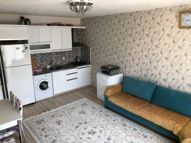 Двухкомнатная квартира с мебелью и техникой  в центре Махмутлара, 55 м2 - Ракурс 2