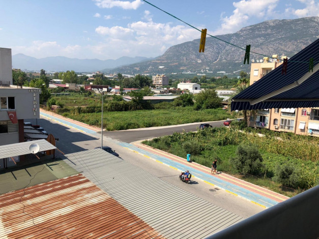 Двухкомнатная квартира с мебелью и техникой  в центре Махмутлара, 55 м2 - Ракурс 7