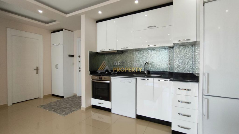 Меблированные апартаменты планировки 1+1, 65м2 в районе Махмутлар - Ракурс 5