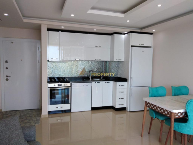 Меблированные апартаменты планировки 1+1, 65м2 в районе Махмутлар - Ракурс 9