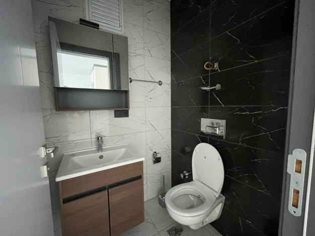 Меблированные апартаменты планировки 1+1, 55м2 с видом на море, район Каргыджак - Ракурс 9