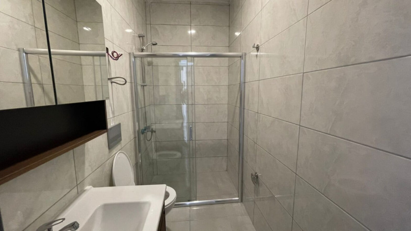 Меблированные апартаменты планировки 1+1, 55м2 с видом на море, район Каргыджак - Ракурс 20