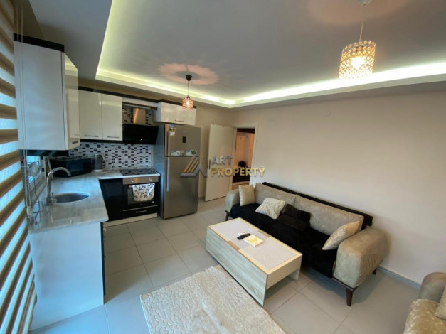 Меблированная квартира планировки 1+1 в районе Махмутлар - Ракурс 26