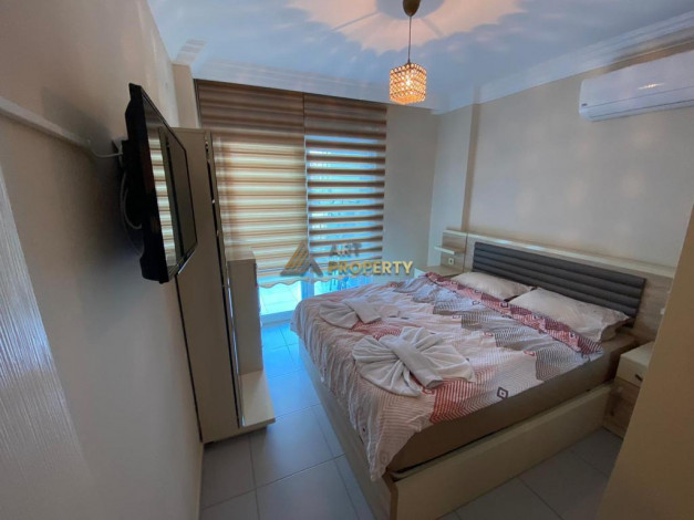 Меблированная квартира планировки 1+1 в районе Махмутлар - Ракурс 27