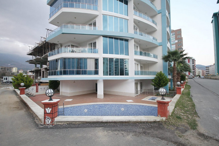 Просторная квартира планировки 1+1  с кухней американского типа, в Махмутларе, Алания, 60 м2. - Ракурс 6