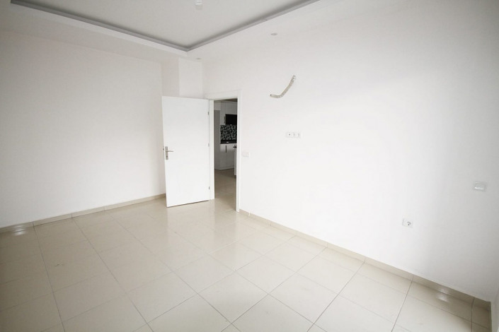 Просторная квартира планировки 1+1  с кухней американского типа, в Махмутларе, Алания, 60 м2. - Ракурс 8