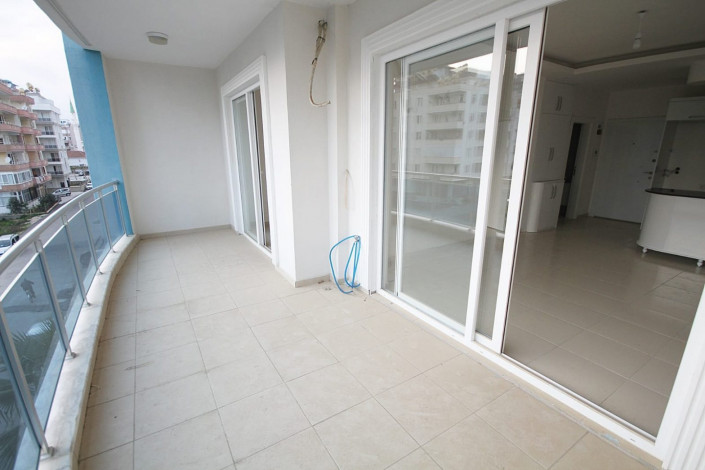 Просторная квартира планировки 1+1  с кухней американского типа, в Махмутларе, Алания, 60 м2. - Ракурс 9