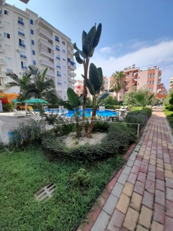 Меблированные апартаменты 1+1, 65м2 в отличном ЖК, район Махмутлар - Ракурс 7