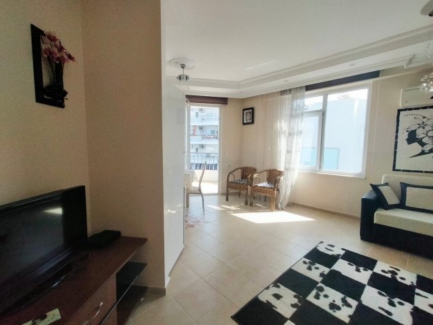 Двухкомнатная квартира рядом с набережной реки Димчай в районе Тосмур, 65 м2 - Ракурс 4