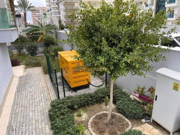 Меблированная квартира планировки 1+1, 65м2 в районе Махмутлар - Ракурс 3