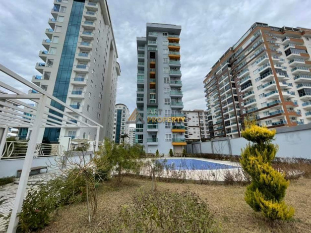 Меблированная квартира планировки 1+1, 65м2 в районе Махмутлар - Ракурс 5