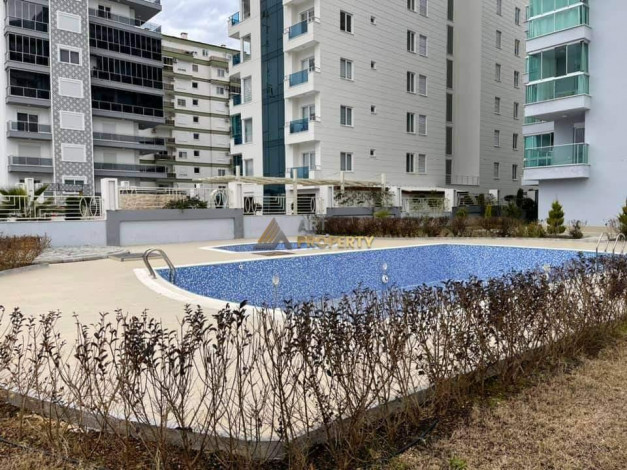 Меблированная квартира планировки 1+1, 65м2 в районе Махмутлар - Ракурс 7