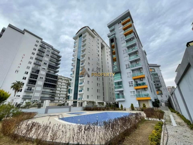 Меблированная квартира планировки 1+1, 65м2 в районе Махмутлар - Ракурс 10