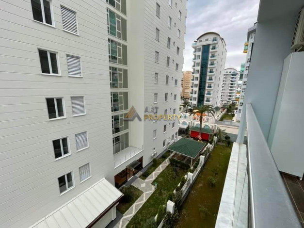 Меблированная квартира планировки 1+1, 65м2 в районе Махмутлар - Ракурс 14