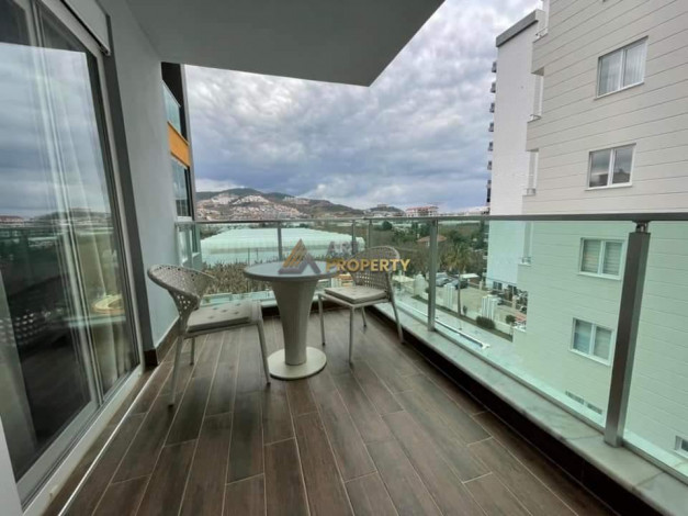 Меблированная квартира планировки 1+1, 65м2 в районе Махмутлар - Ракурс 16