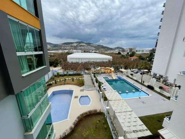 Меблированная квартира планировки 1+1, 65м2 в районе Махмутлар - Ракурс 20