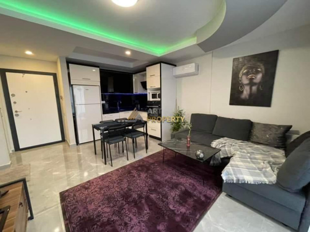 Меблированная квартира планировки 1+1, 65м2 в районе Махмутлар - Ракурс 21