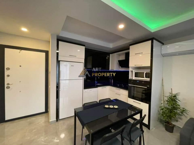 Меблированная квартира планировки 1+1, 65м2 в районе Махмутлар - Ракурс 27