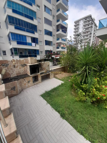 Меблированная квартира планировки 1+1, 70м2 в районе Махмутлар - Ракурс 2