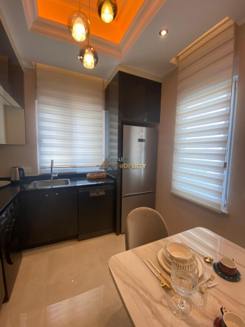 Меблированная квартира планировки 2+1, 130м2 с видом на море в элитном ЖК, район Махмутлар - Ракурс 3