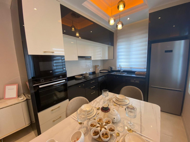 Меблированная квартира планировки 2+1, 130м2 с видом на море в элитном ЖК, район Махмутлар - Ракурс 4