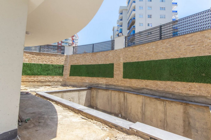 Меблированная квартира 1+1 в новом комплексе 2021 года в районе Махмутлар,  55 м2 - Ракурс 8