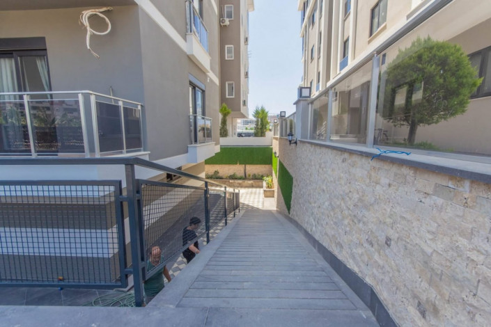 Меблированная квартира 1+1 в новом комплексе 2021 года в районе Махмутлар,  55 м2 - Ракурс 13