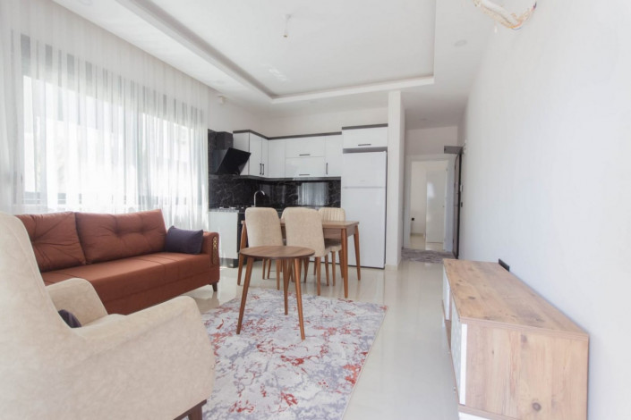 Меблированная квартира 1+1 в новом комплексе 2021 года в районе Махмутлар,  55 м2 - Ракурс 17