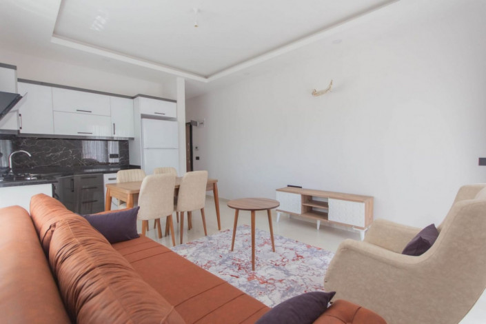 Меблированная квартира 1+1 в новом комплексе 2021 года в районе Махмутлар,  55 м2 - Ракурс 19