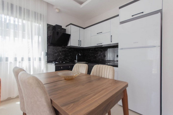 Меблированная квартира 1+1 в новом комплексе 2021 года в районе Махмутлар,  55 м2 - Ракурс 20