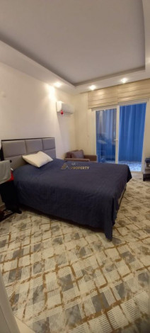 Квартира планировкой 1+1 с кухней американского типа, в районе Махмутлар, 70 м2. - Ракурс 14