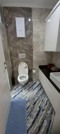 Квартира планировкой 1+1 с кухней американского типа, в районе Махмутлар, 70 м2. - Ракурс 15