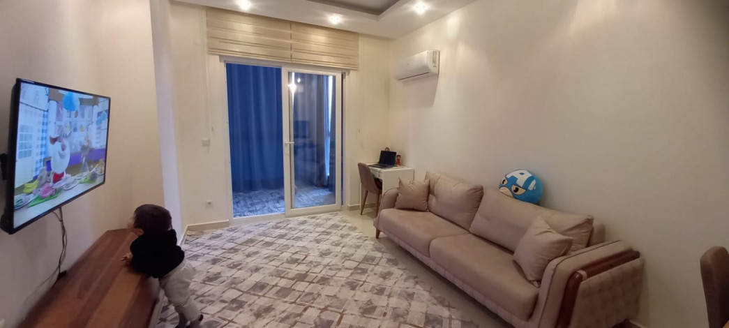 Квартира планировкой 1+1 с кухней американского типа, в районе Махмутлар, 70 м2. - Ракурс 16