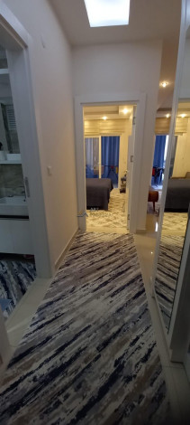 Квартира планировкой 1+1 с кухней американского типа, в районе Махмутлар, 70 м2. - Ракурс 21