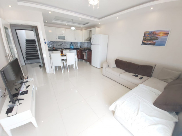 Просторная двухкомнатная квартира  с мебелью и техникой в  Махмутларе, Алания, 70 м2 - Ракурс 3